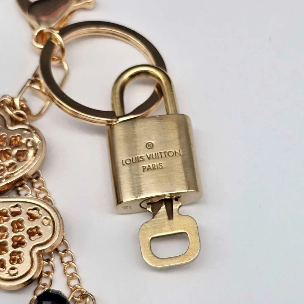 Authentic Louis Vuitton Lock & Key with unbranded Flower Bagcharm, Keycharm